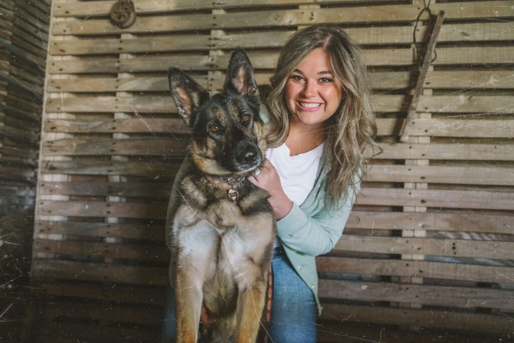 Emily McKnight holding her dog Greta